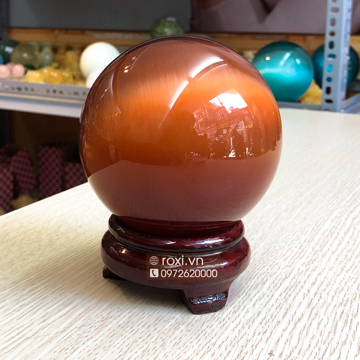 QUẢ CẦU PHONG THỦY MẮT MÈO NÂU ĐẤT 1,3KG - 10CM